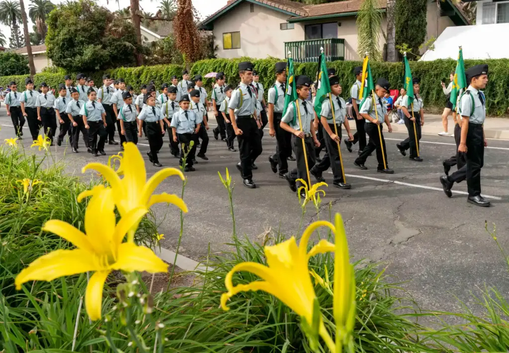 Students from St. Catherineâs Academy march down N. Kraemer Blvd....