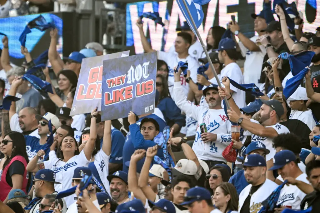 Dodger fans wave rally towels during the first inning of...