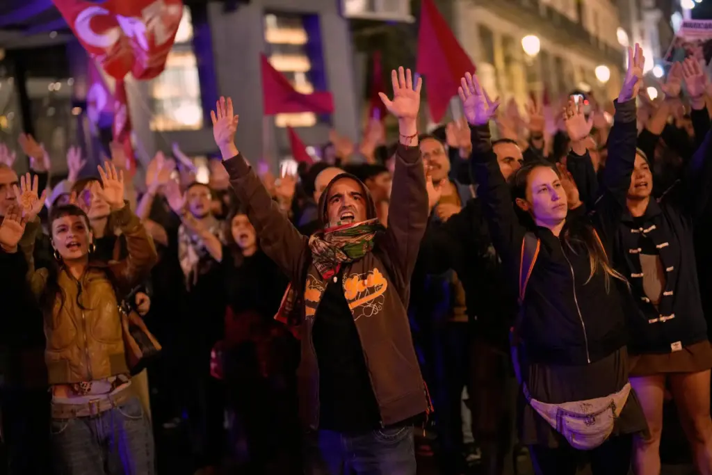 Protesters gather after the reported death of María del Carmen...