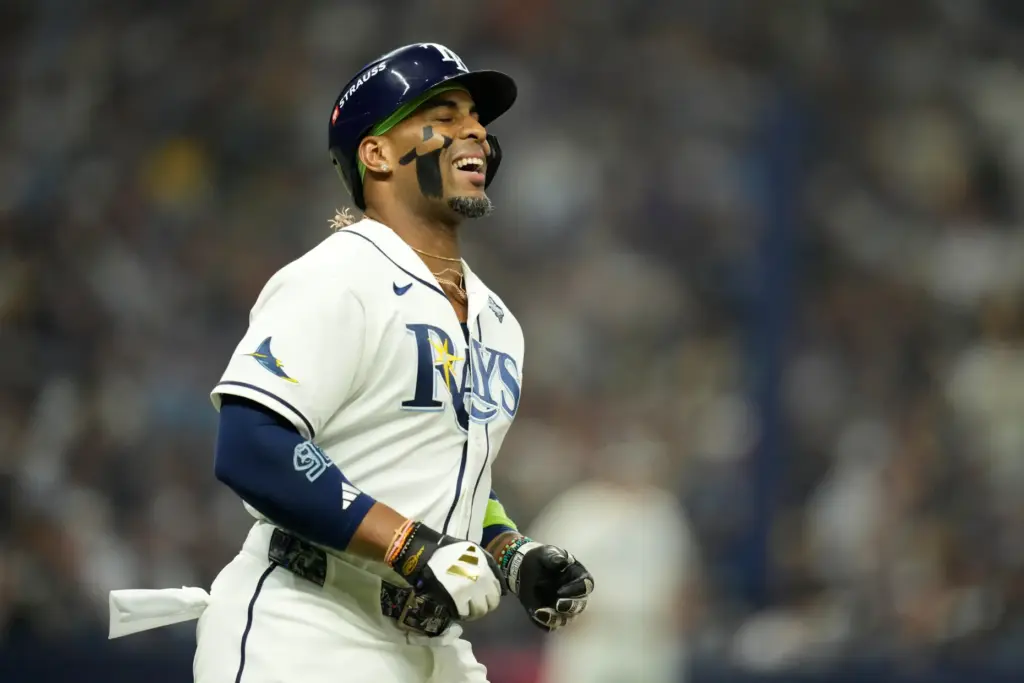 The Tampa Bay Rays’ Yandy DÃ­az reacts after flying out...