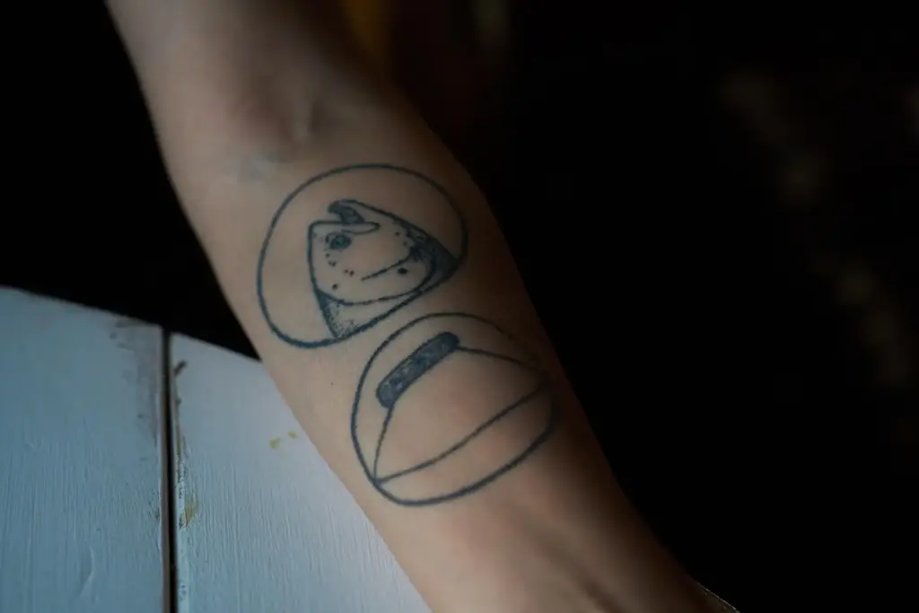 Brooke Woods shows her salmon tattoo in Rampart, Alaska, Monday,...