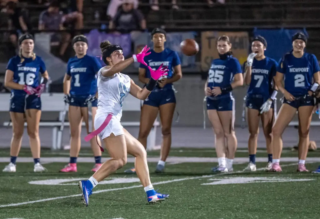 Corona del Mar receiver Mia Balabanian (1) makes a catch...