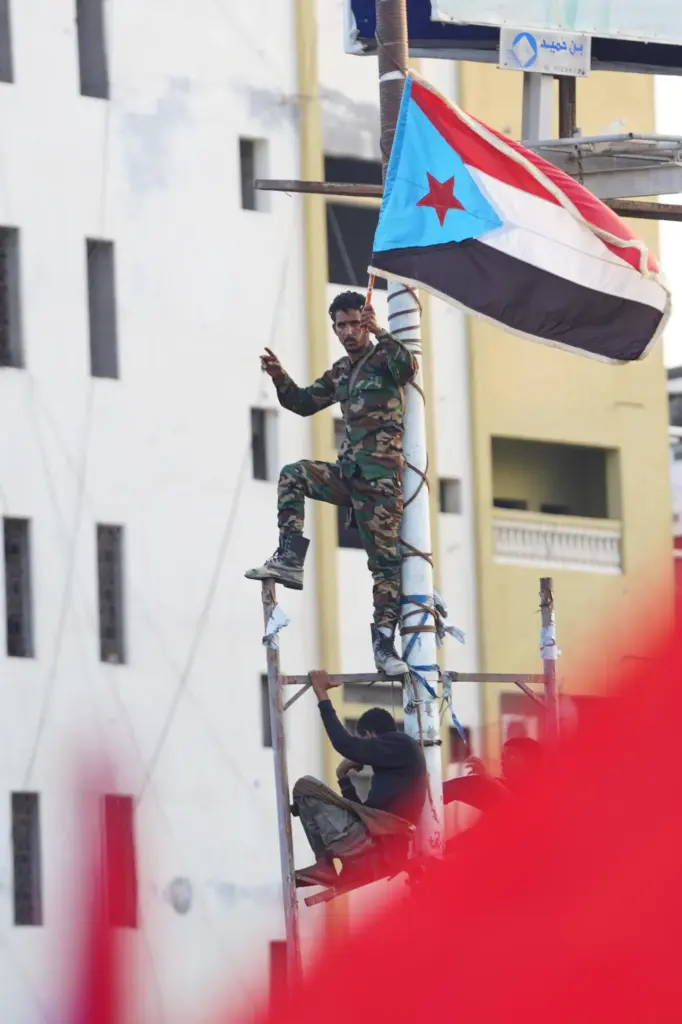 A supporter of the Southern Transitional Council (STC) waves South...