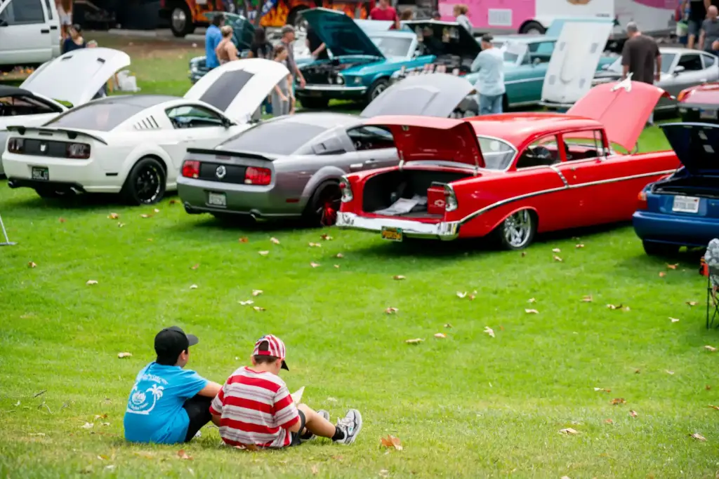 Nico Tang and Bryce Locht look out over the car...
