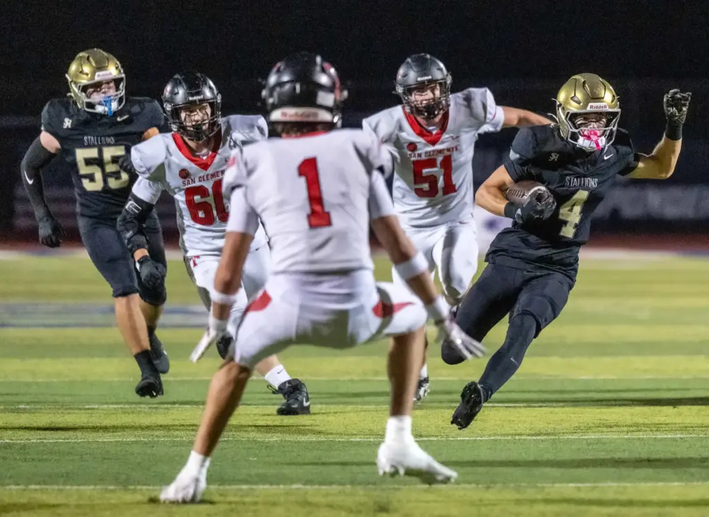 San Juan Hills wide receiver Chayden Cadam (4) carries the...