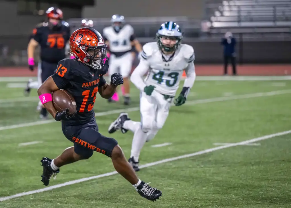 Orange running back Jeremiah Dunklin (13) carries the ball during...