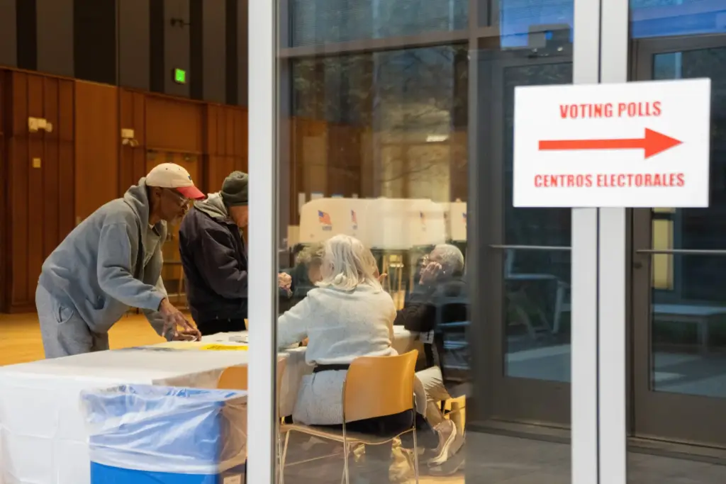 Voters select their “I Voted” stickers at the Silver Spring...
