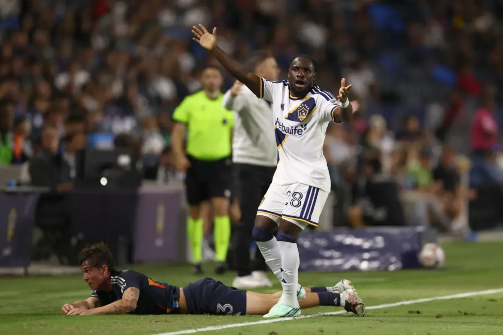 Los Angeles Galaxy forward Joseph Paintsil, right, reacts to a...