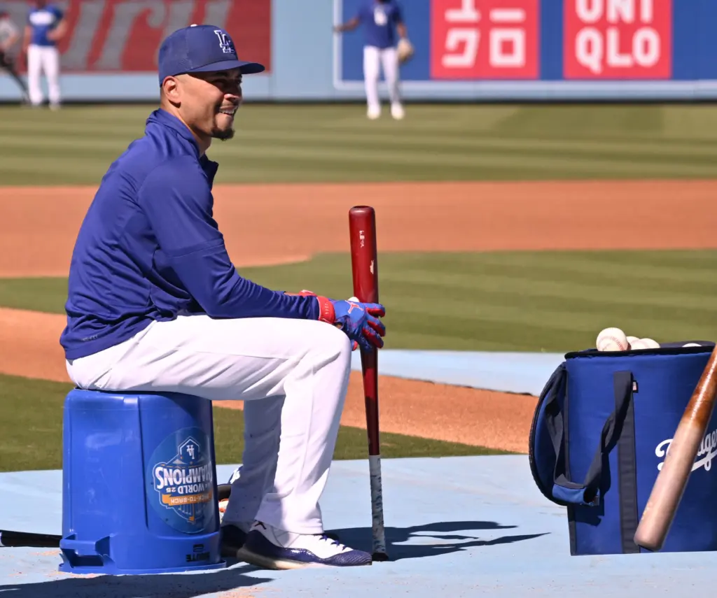 Dodgers shortstop Mookie Betts waits his turn during batting practice...