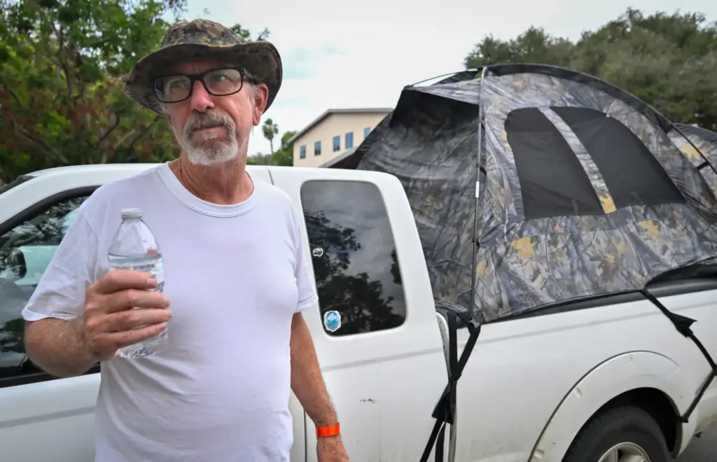Mike Davies talks about the setup of a tent in...
