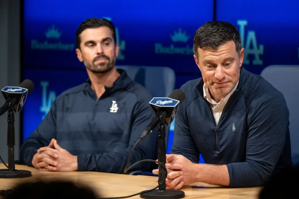 Dodgers president of baseball operations Andrew Friedman, right, and Dodgers...
