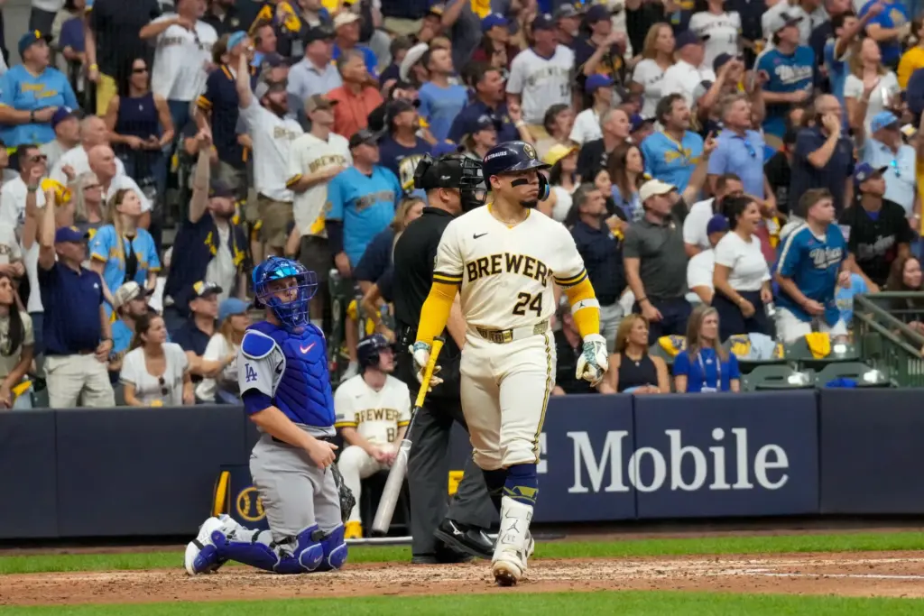 The Milwaukee Brewers’ William Contreras watches the flight of his...