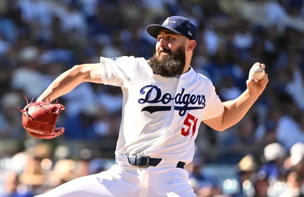 Dodgers relief pitcher Alex Vesia throws to the plate during...