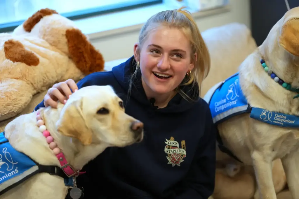 Quinn McEvers, a senior at Evergreen High School, visits with...