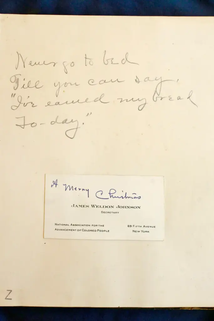 The inside cover of a book holding the original poem...