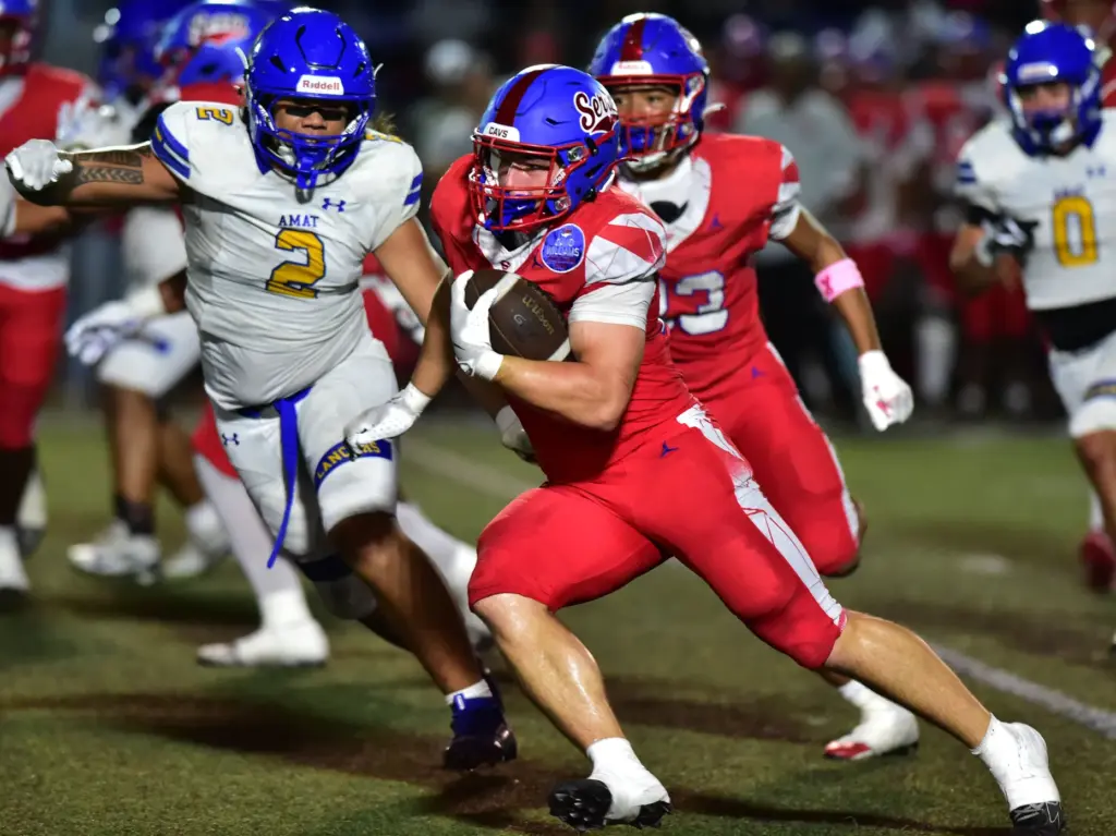 Serra back AJ McBean cuts across Bishop Amat defense for...