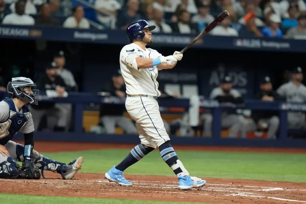 Tampa Bay Rays’ Jonathan Aranda watches his solo home run...