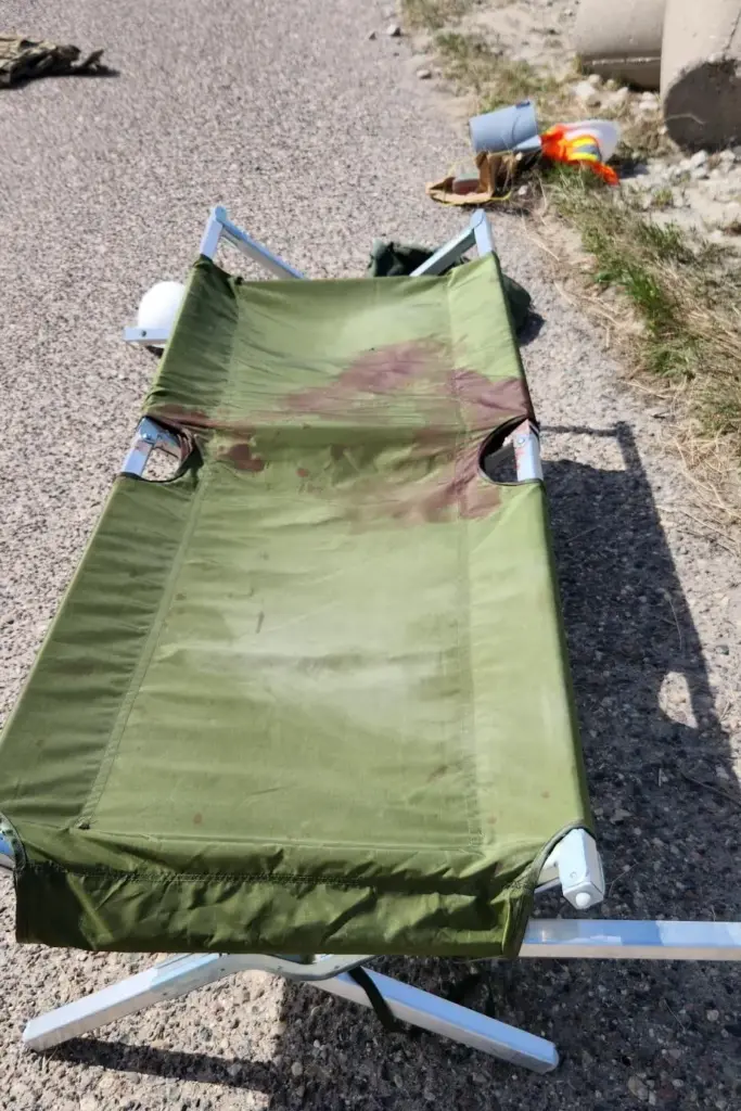 In this photo obtained by The Associated Press, blood stains...