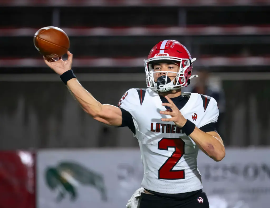 Orange Lutheran quarterback Reagan Toki fires a pass against Mater...