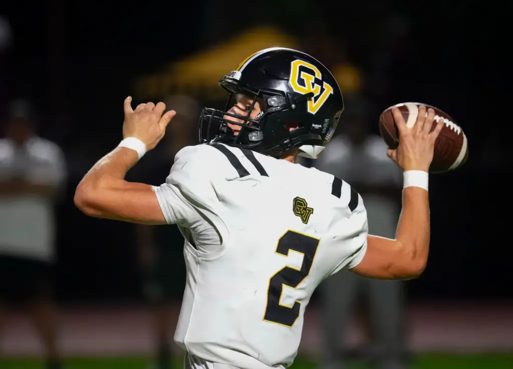 Capistrano Valley quarterback Talon Spencer gets ready to throw a...