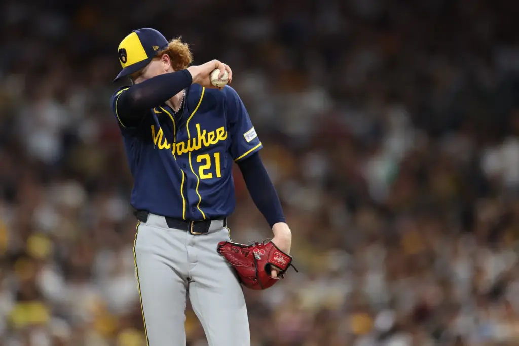 Milwaukee Brewers starting pitcher Dustin May pauses before being removed...