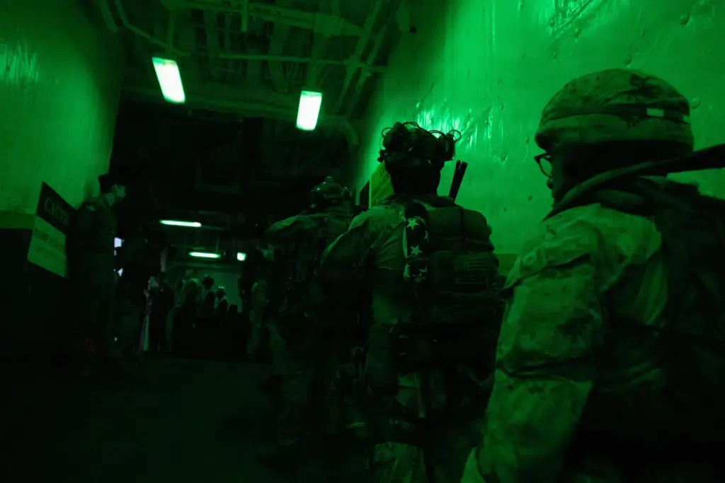 U.S. Marines from the 31st Marine Expeditionary Unit depart USS...