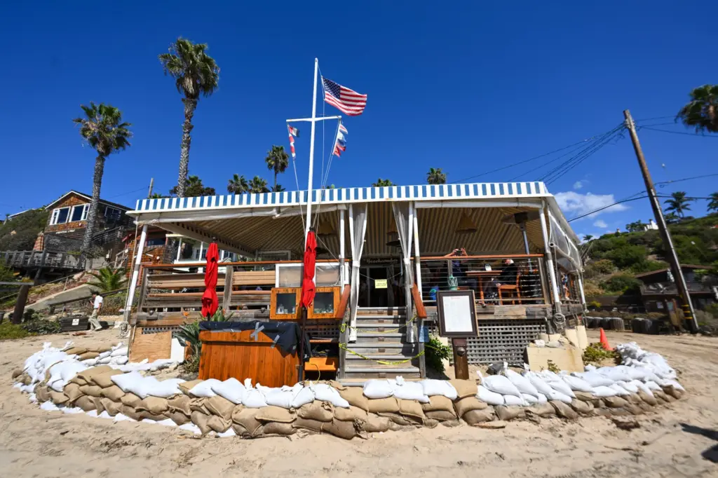 Sandbags surround The Beachcomber at The Historic District at Crystal...