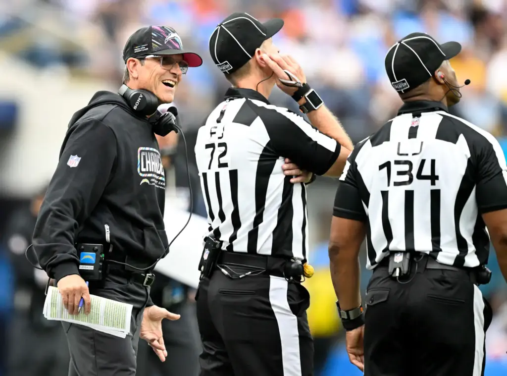 Chargers coach Jim Harbaugh reacts to losing a challenge during...