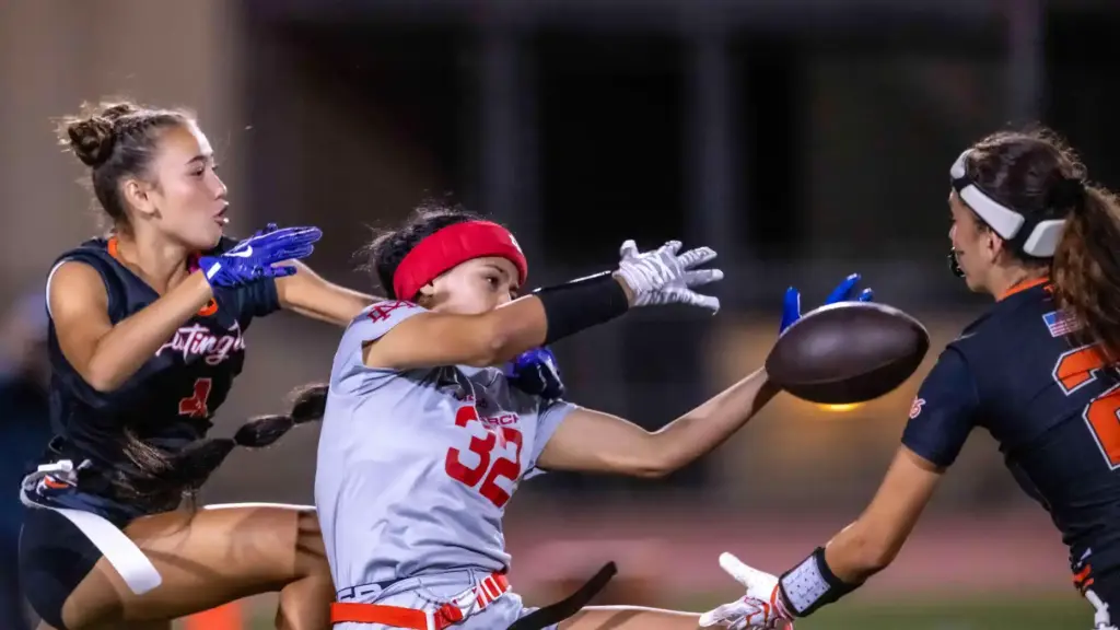 Huntington Beach defenders Isla Castillo (4), left, and Brianna Massion...
