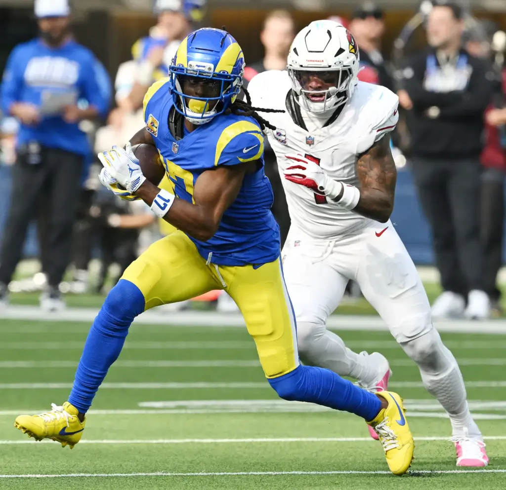 Rams wide receiver Davante Adams (17) makes the catch behind...