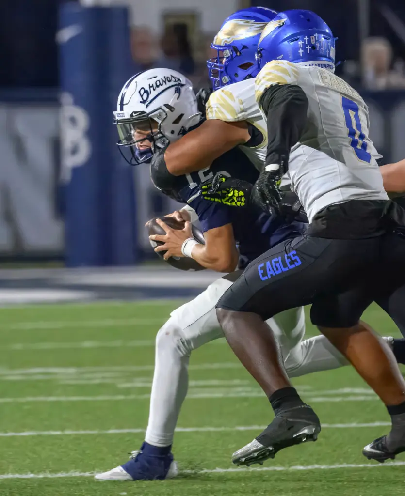 St. John Bosco quarterback Koa Malau’ulu is sacked by a...