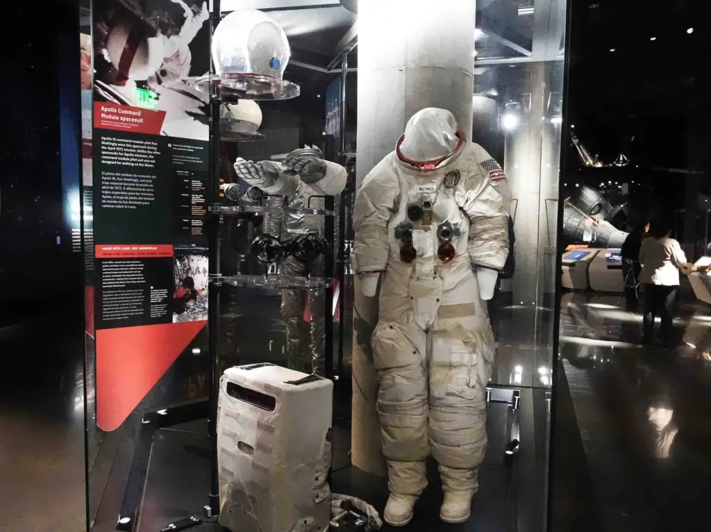 Space suits used on the shuttle on display as the...