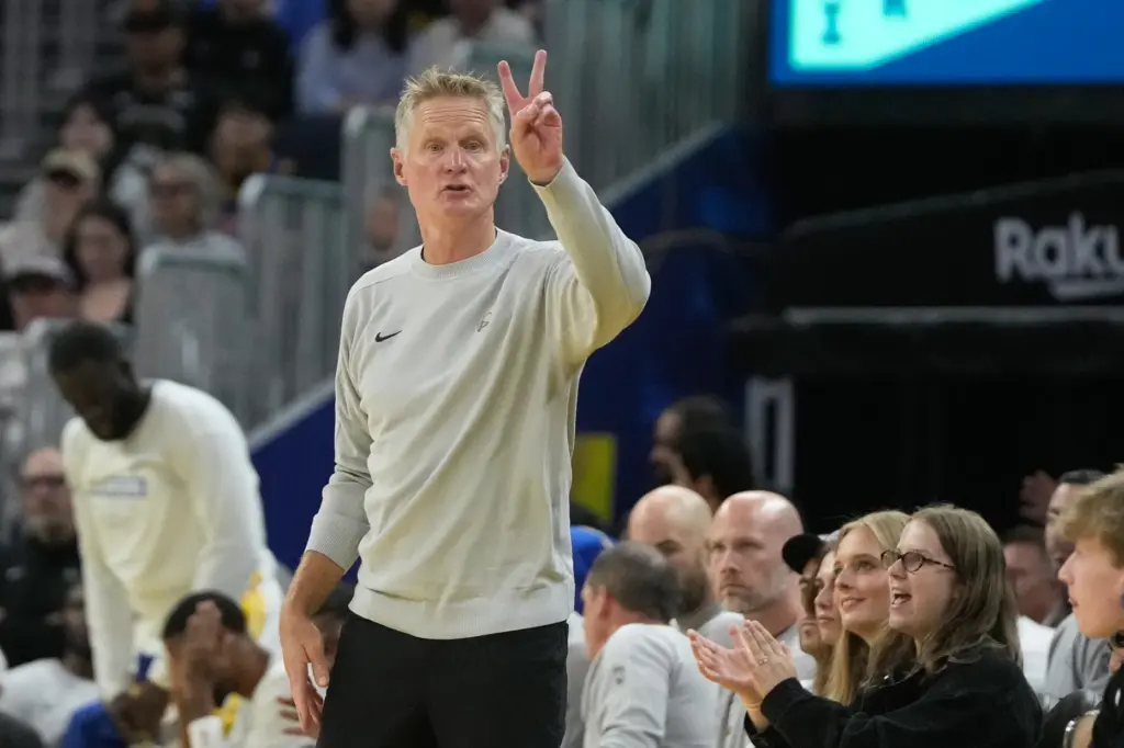 Golden State Warriors head coach Steve Kerr gestures from the...