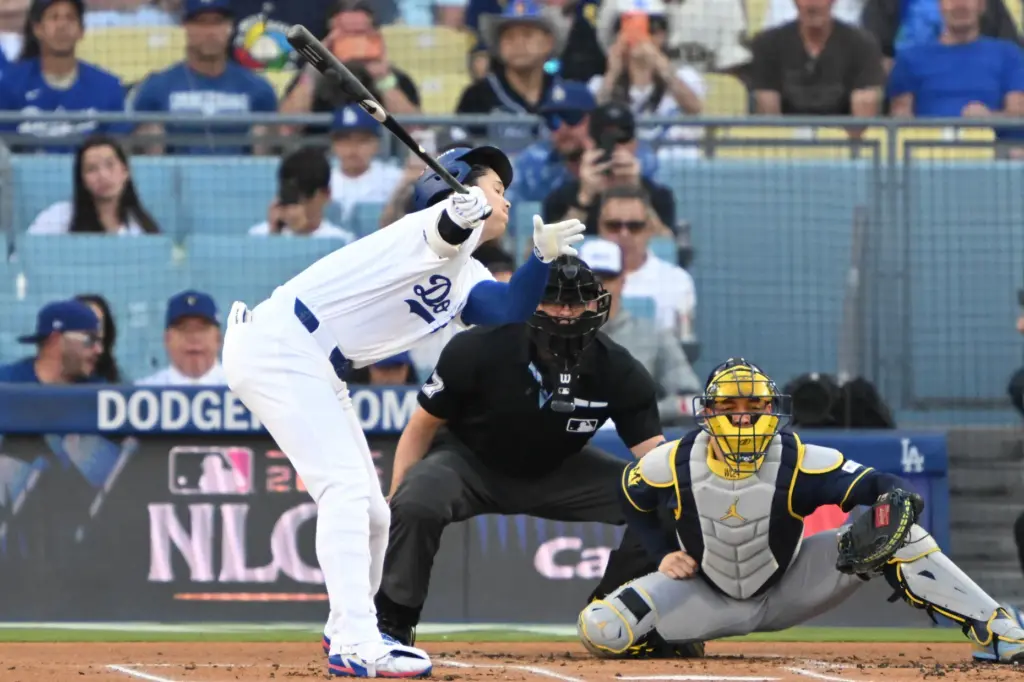 Dodgers star Shohei Ohtani strikes out swinging during the first...
