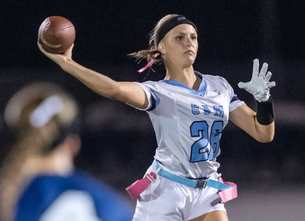 Corona del Mar quarterback Charlotte Ring (26) throws the ball...