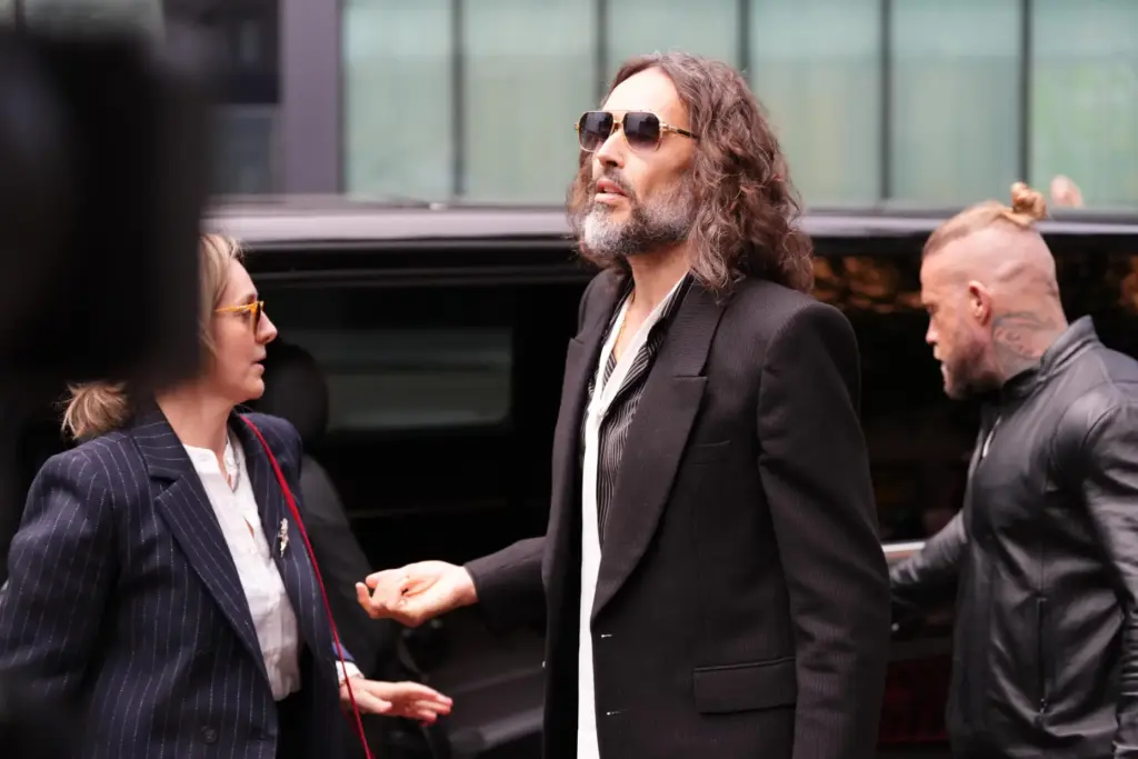 Russell Brand speaks to the media outside a London Courthouse.