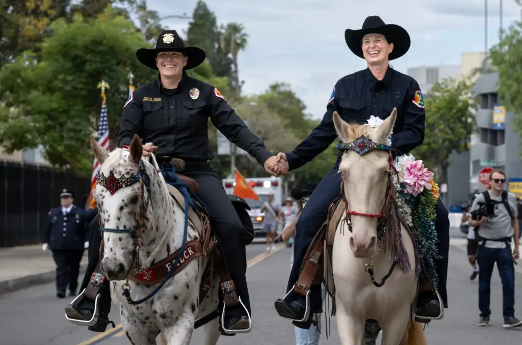 Taylor Cohen, left, with Falck Mobile Health, and her wife,...