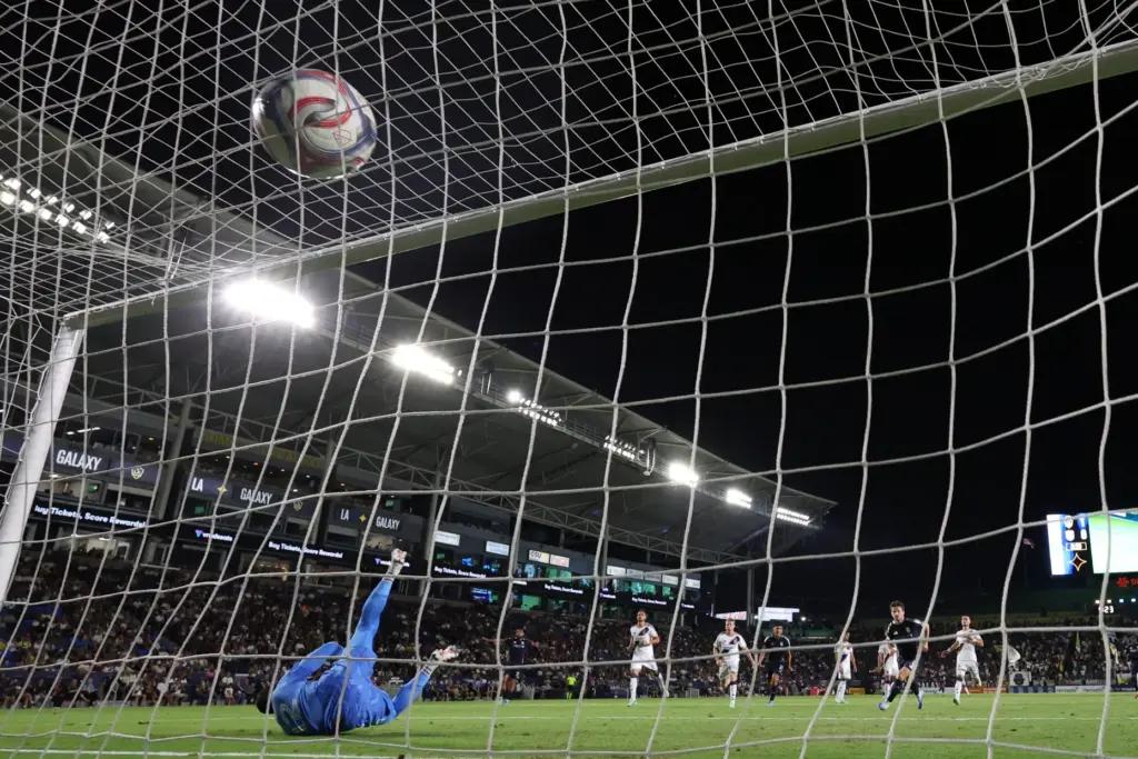San Diego FC forward Anders Dreyer, second from right, scores...