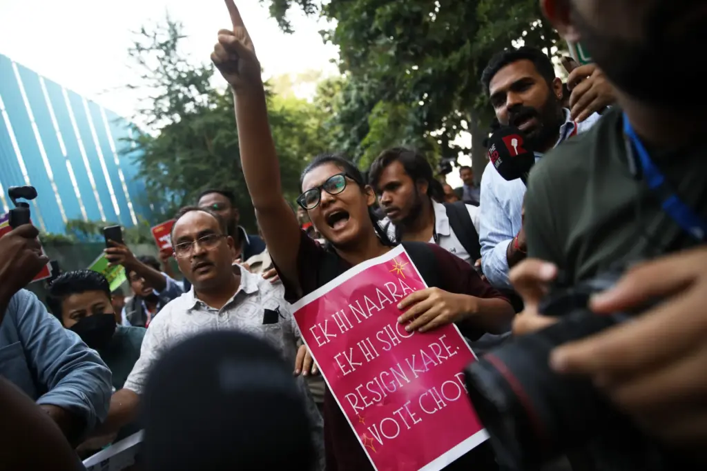 Student activist Neha Bora, center, shouts slogans during a youth...