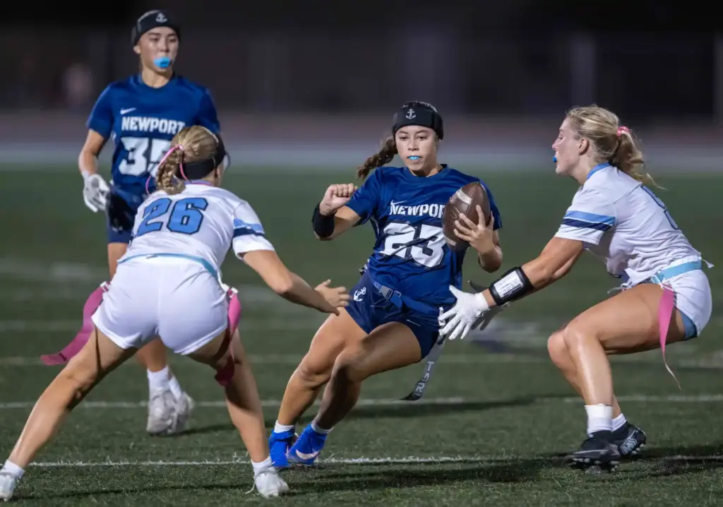 Newport Harborâs Chloe Enciso (23) carries the ball during a...