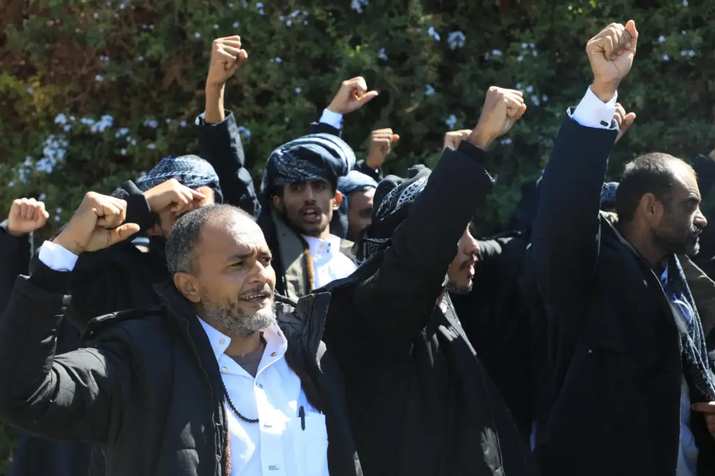 Prisoners detained in connection with Yemen's ongoing conflict react before they are freed.