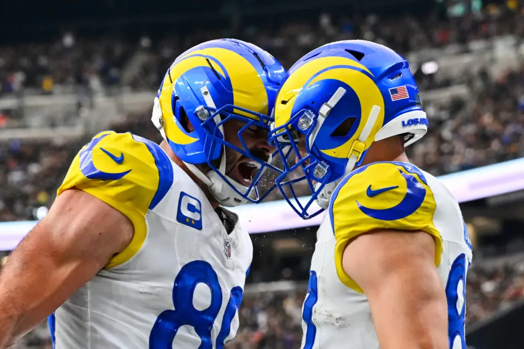 Rams tight end Davis Allen, right, celebrates his touchdown with...