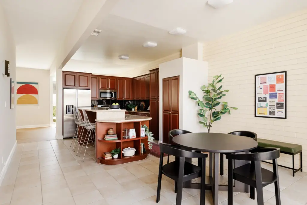 The family room, staged as a casual dining area, with...