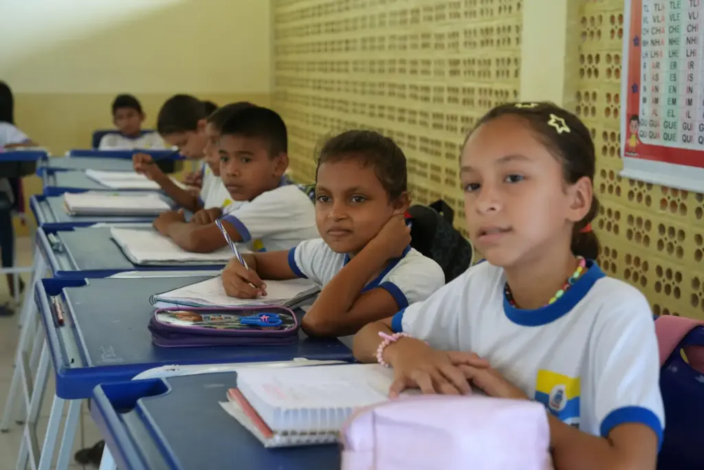 Students attend class at the Sao Benedito School, powered by...