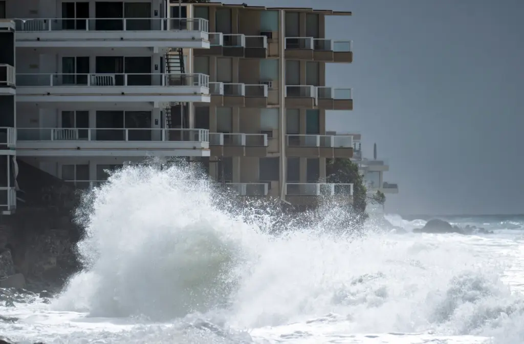 Rough surf pounds Laguna Beach near homes on Sunday, October...
