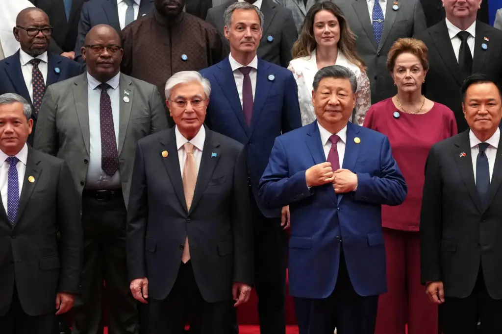 FILE – Chinese President Xi Jinping, center right, Kazakh President...