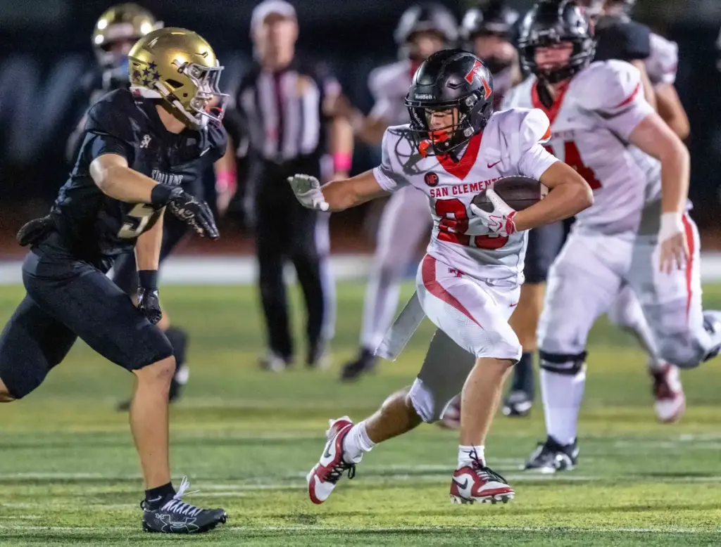 San Clemente tailback Charlie Bunker (23) carries the ball during...