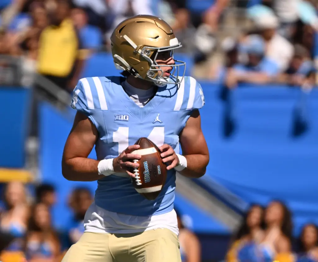 UCLA quarterback Ty Dieffenbach (14) prepares to throw a pass...