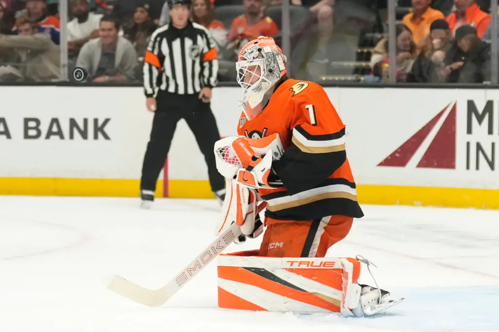 Ducks goaltender Lukas Dostal deflects a shot during the first...