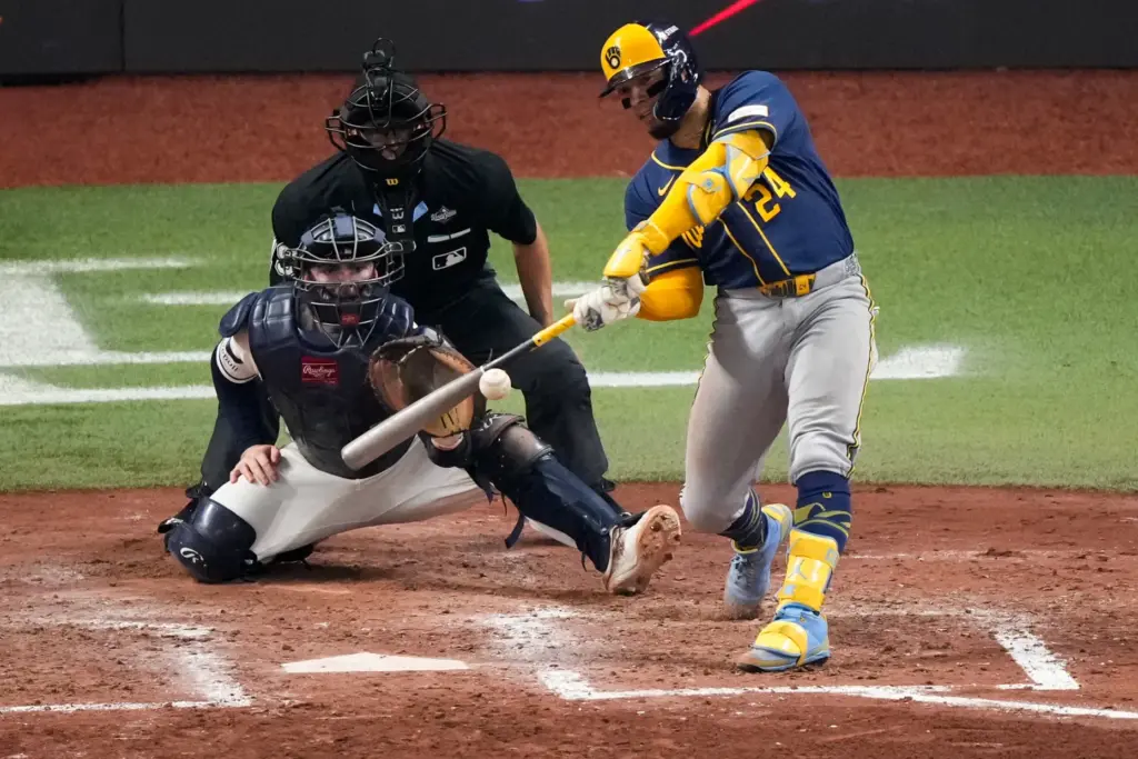 The Milwaukee Brewers’ William Contreras follows through on an RBI...